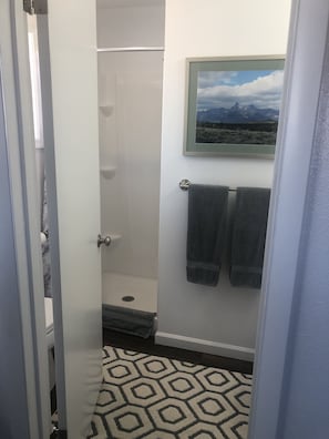 Shower, towels, soap, shampoo