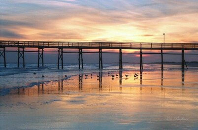 Quaint Villa backing onto a golf course with view of water..