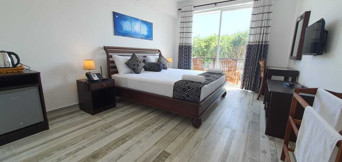 Deluxe Double Room | Minibar, in-room safe, desk, laptop workspace