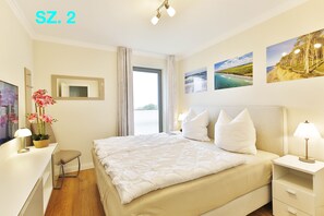 2 chambres, coffre-fort, bureau, fer et planche à repasser