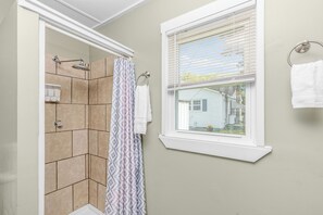 Shower, hair dryer, towels, soap