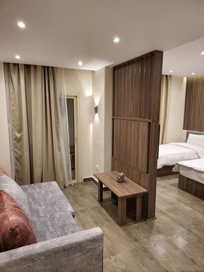 Luxury Triple Room, 1 Bedroom, Non Smoking, City View | Living area - STEPS IN Pyramids View (Giza)