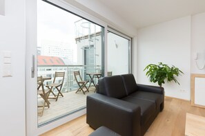 Departamento superior | Área de sala de estar | Televisión de pantalla plana de 1 pulgadas con canales por cable