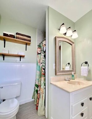 Shower, hair dryer, towels, soap