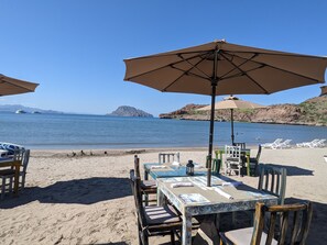 On the beach, sun loungers, beach towels
