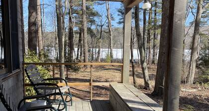Classic Maine Lake Cottage with two beaches on 8 private acres.