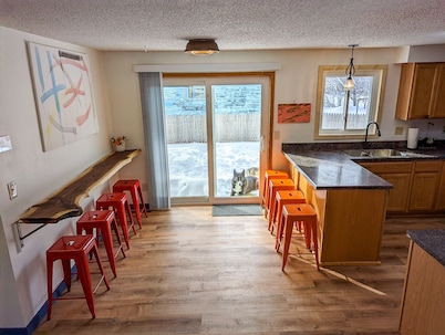 In town, close to the trails, fully fenced in yard!