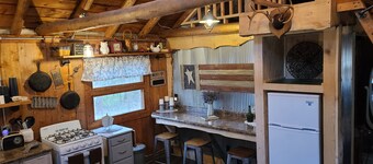 Wood Haven Lodge. Secluded, cozy log cabin in Northern Michigan.