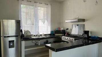 Microwave, oven, coffee/tea maker, cookware/dishes/utensils