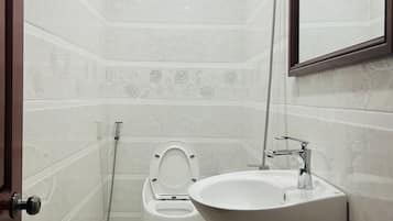 Shower, rainfall showerhead, designer toiletries, hair dryer