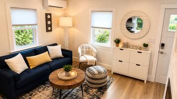 Smart TV, fireplace, books, printers