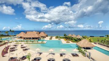 4 outdoor pools, open 9:00 AM to 6:00 PM, free cabanas, pool umbrellas
