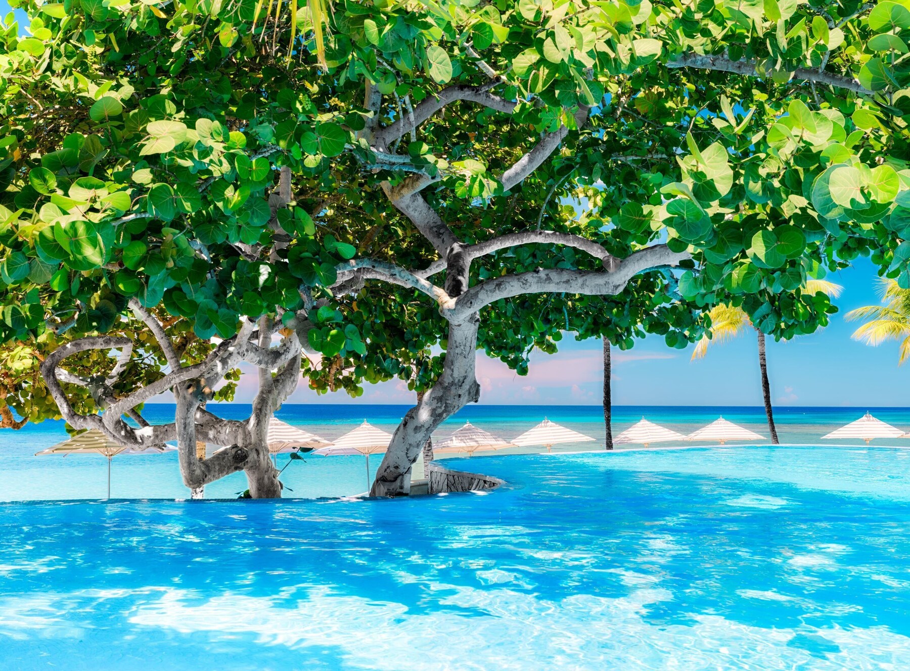 2 outdoor pools, pool umbrellas, sun loungers