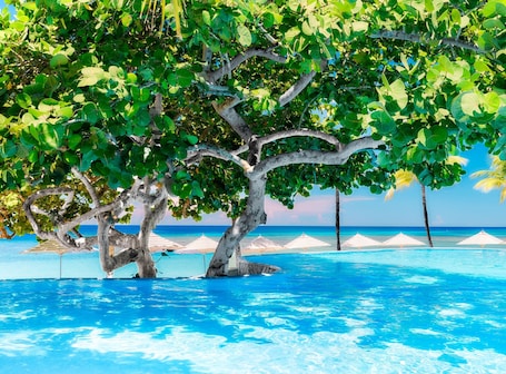 2 outdoor pools, pool umbrellas, sun loungers