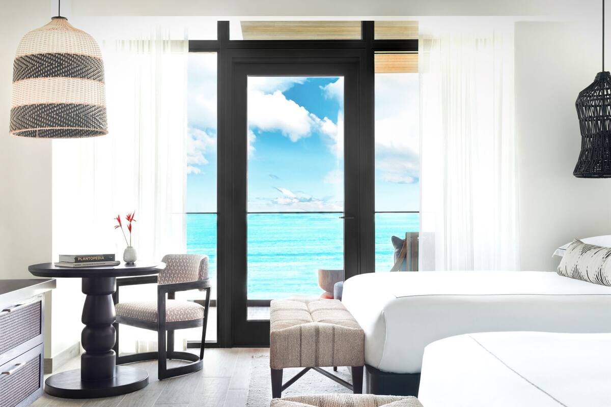 Quarto premium, 2 camas Queen, vista para o oceano | Lençóis italianos Frette, roupas de cama premium