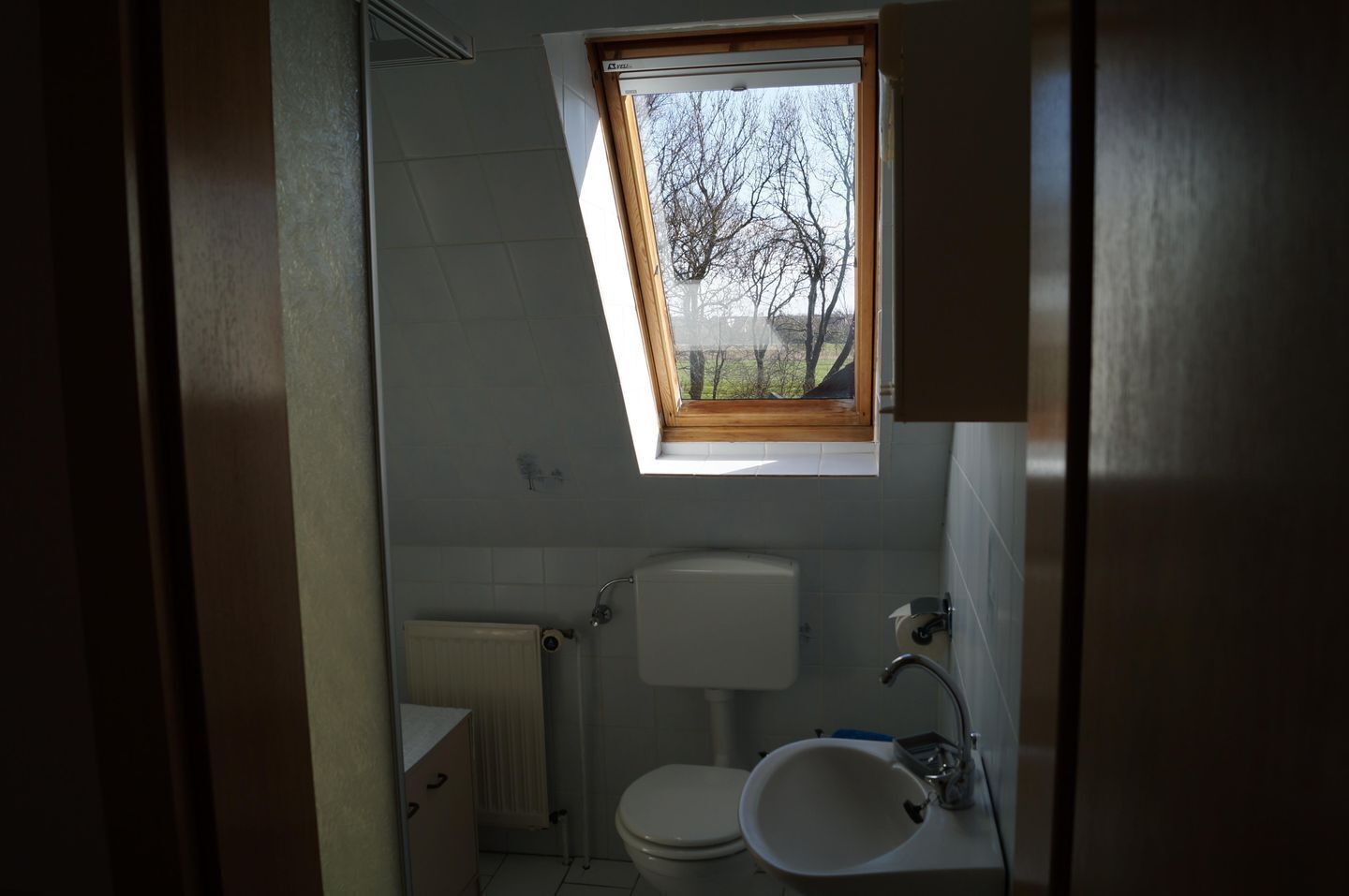 Chuveiro, toalhas de banho