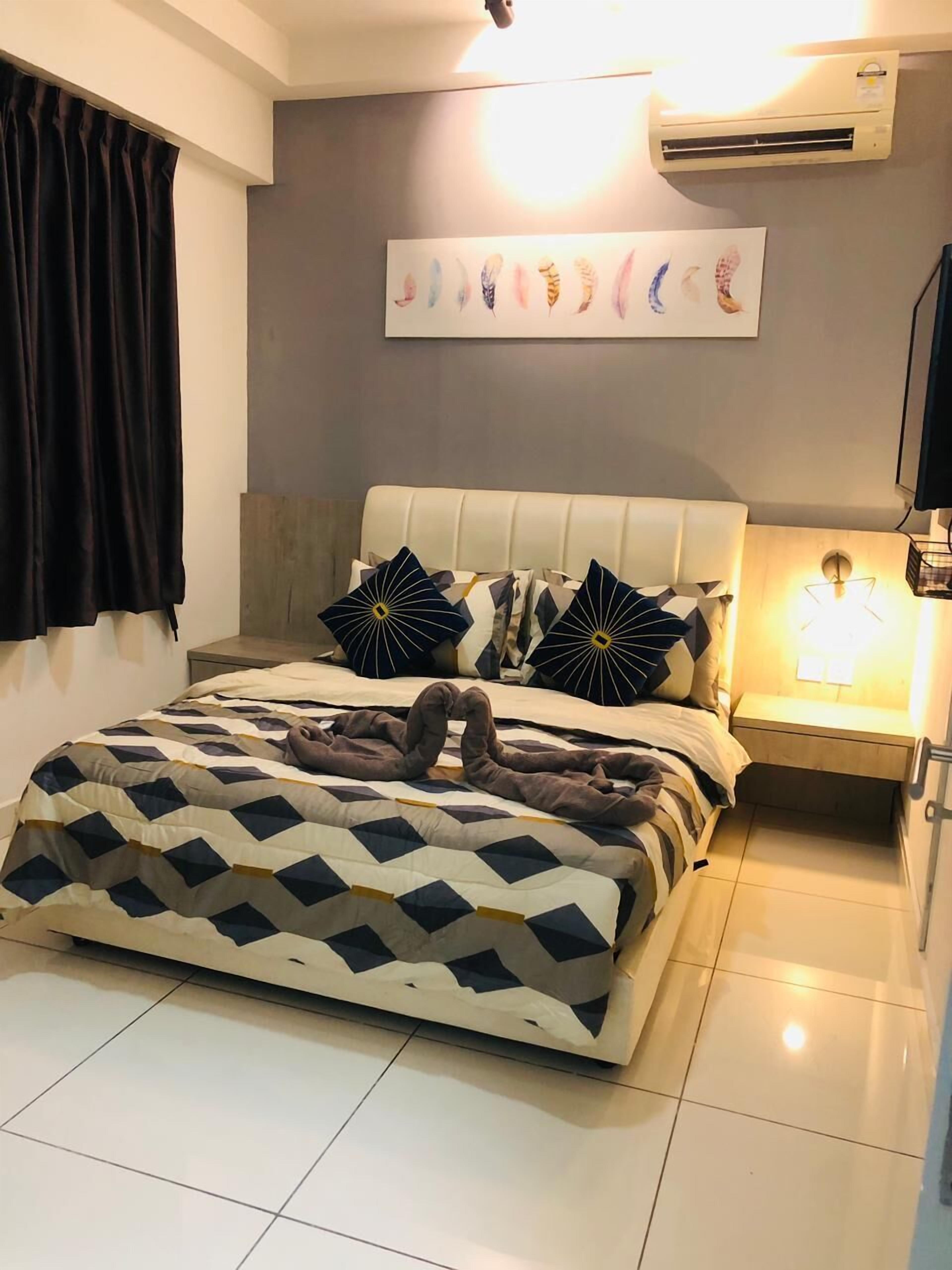 Desk, iron/ironing board, bed sheets