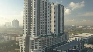 A high-rise building with multiple floors, likely a residential or commercial complex. - 1 Tebrau Residences by YML Home (Johor Bahru)