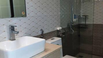 Shower, free toiletries, hair dryer, slippers