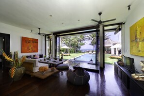 Luxury Villa, 4 Bedrooms, Oceanfront | Living area | 25-cm LCD TV with digital channels, TV