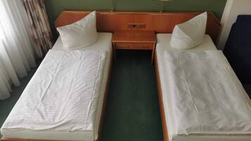 Desk, laptop workspace, free WiFi, bed sheets