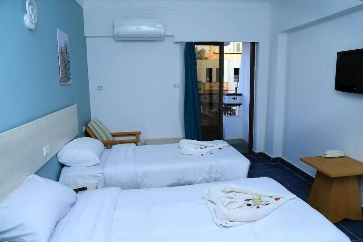 Seprai premium, tempat tidur Tempur-Pendic, minibar, dan kedap suara