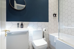 Hair dryer, towels, soap, shampoo