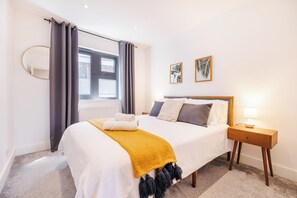 2 dormitorios, tabla de planchar con plancha, wifi gratis y ropa de cama