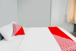 Economy Single Room | Bed sheets - Hotel O Restu Ibu Homestay Syariah (Batam)