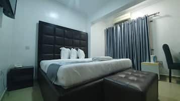 Suíte executiva | 1 quarto, camas com colchões de espuma com sistema de memória