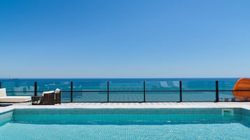 Premium bedding, down duvets, memory-foam beds, in-room safe