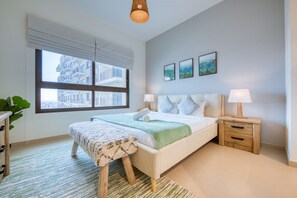 2 chambres, coffre-fort, fer et planche à repasser