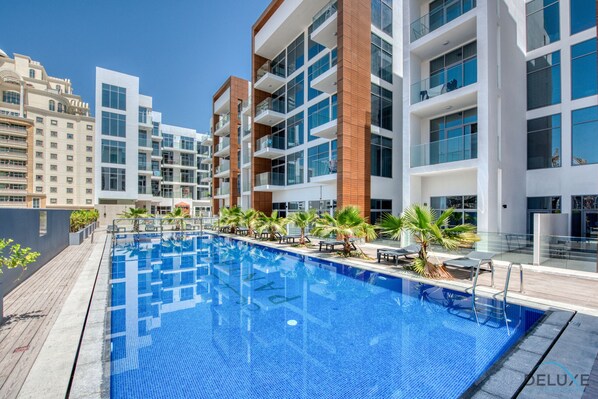 Pool - Romantic Studio in Pantheon Elysee JVC by Deluxe Holiday Homes (Dubai)