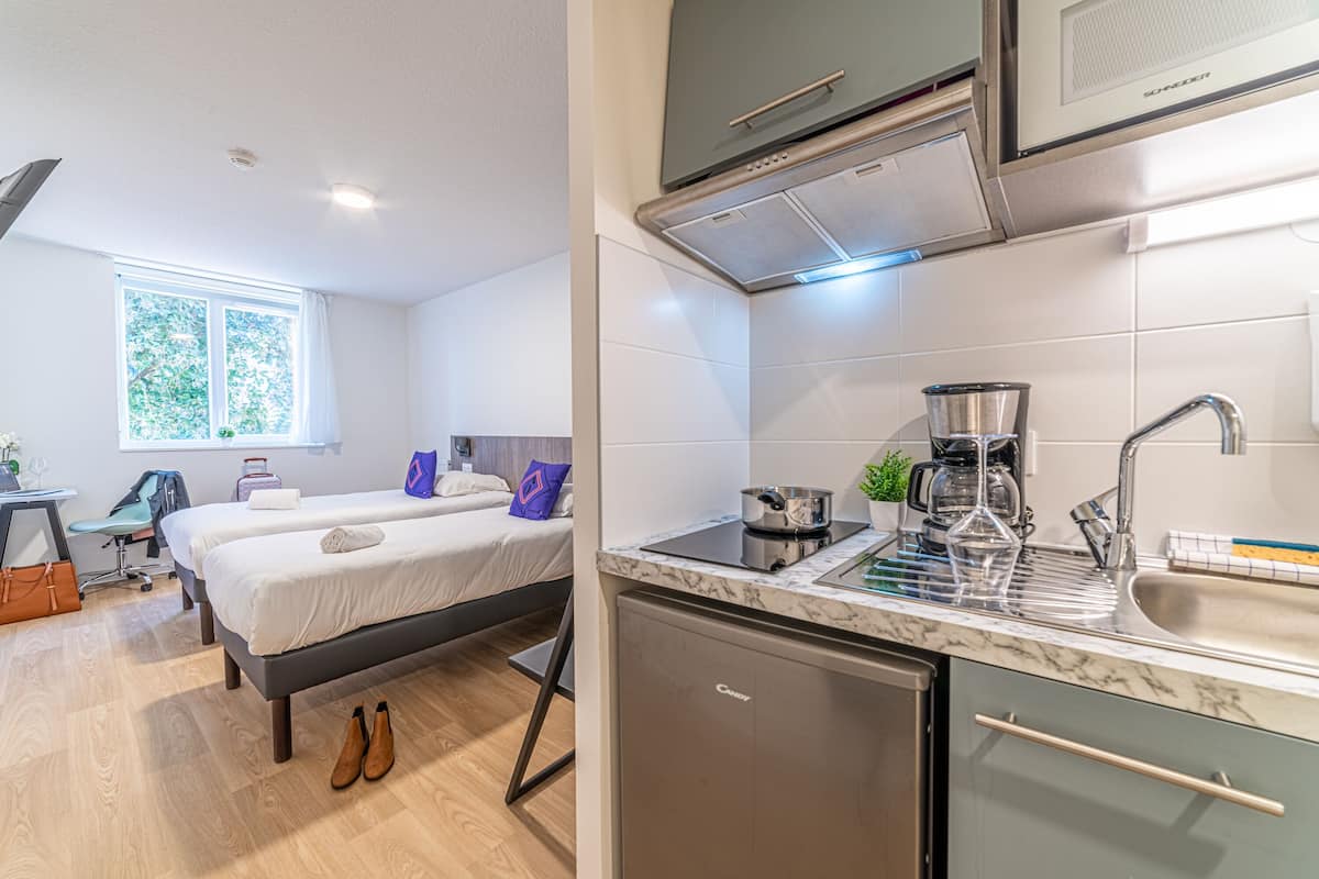 Departamento clásico, 2 camas individuales | 1 habitación, wifi gratis y ropa de cama