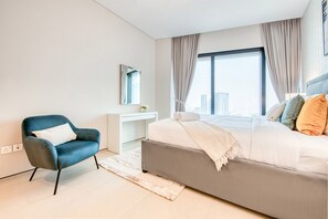 1 chambre, coffre-fort, fer et planche à repasser