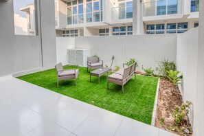 Terrace/patio - Opulent 3BR Townhouse at DAMAC Hills 2 Akoya by Deluxe Holiday Homes (Dubai)