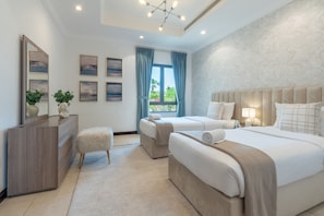 5 chambres, coffres-forts dans les chambres, fer et planche Ă repasser