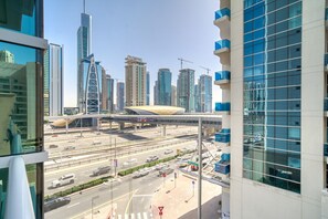 Experience the vibrant cityscape with a unique blend of modern architecture and urban infrastructure.