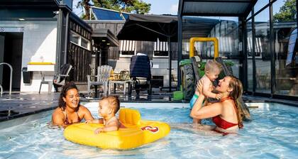 Looking for the perfect family holiday bungalow? Look no further than our 6-person child-friendly bungalow at Norgerberg in Drenthe. Enjoy the sunshine and fresh forest air while your children play and explore in nature.