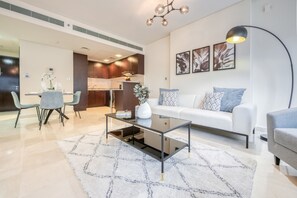 TV - Gorgeous 1BR at Sky Gardens DIFC by Deluxe Holiday Homes (Dubai)