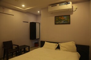 Chambre Double Deluxe | Coin séjour
