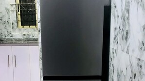 A double-door refrigerator with a brand name visible on the top. - Umbrella Properties Eleyele Ibadan (Ibadan)