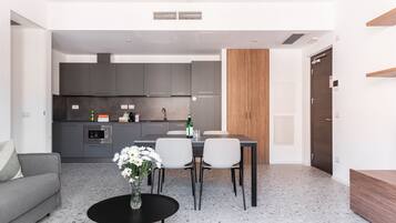 XL 1 Bedroom Apartment, Balcony,Sofa Bed | Living area | 43-inch Smart TV with cable channels, TV