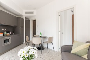 L 1 Bedroom Apartment, Balcony, Sofa Bed | Living area | 43-inch Smart TV with cable channels, TV - Numa Rome Verso (Rome)