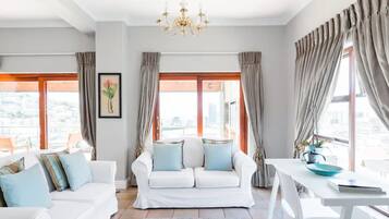 Basic House, Multiple Beds | Living area | TV, fireplace