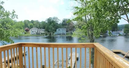 The Cottage at Highland Lake, year-round, waterfront with a boat dock