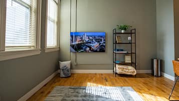 Premium Apartment | Living area | 55-inch Smart TV with digital channels, TV