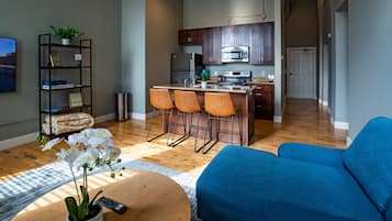 Premium Apartment | Living area | 55-inch Smart TV with digital channels, TV