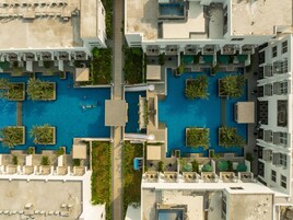 3 outdoor pools, open 8:00 AM to 8:00 PM, free cabanas, pool umbrellas