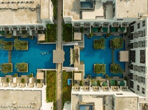 3 outdoor pools, open 8:00 AM to 8:00 PM, free cabanas, pool umbrellas - Pramod Lands End Resort, a Member of Radisson Individuals (Brahmapur)